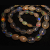 14 inches Very Rare Ethiopian Opal Very Unique Super Rare Ethiopian Opal Smooth Oval Super Rare Inside Fire Opal Size 4 -10mm approx really amazing QUALITY
